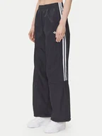 Spodnie sportowe damskie - adidas Spodnie dresowe adicolor Teamgeist JD0256 Czarny Oversize - miniaturka - grafika 1