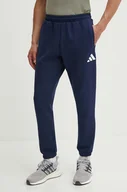 Spodnie męskie - adidas Performance spodnie dresowe Olympic kolor granatowy z nadrukiem JF6683 - miniaturka - grafika 1