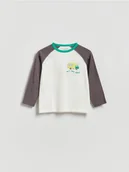 Bluzki dla niemowląt - Reserved - Bawełniany longsleeve z nadrukiem - złamana biel - miniaturka - grafika 1