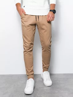 Spodnie męskie - Spodnie męskie materiałowe JOGGERY - beżowe V10 P885 - grafika 1