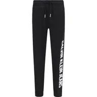 Spodnie i spodenki dla chłopców - CALVIN KLEIN JEANS Spodnie dresowe | Relaxed fit - miniaturka - grafika 1