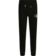 Spodnie i spodenki dla chłopców - CALVIN KLEIN JEANS Spodnie dresowe | Regular Fit - miniaturka - grafika 1
