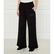 Dresy damskie - EA7 Spodnie dresowe flare fit - miniaturka - grafika 1