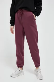 Spodnie damskie - 4F spodnie dresowe kolor fioletowy gładkie - grafika 1