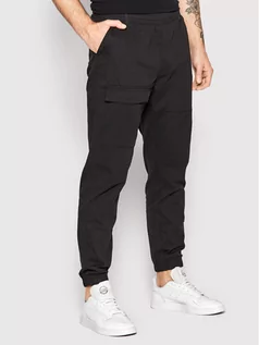 Spodnie męskie - Outhorn Spodnie materiałowe SPMC600 Czarny Regular Fit - grafika 1