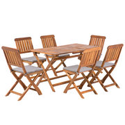 Fotele i krzesła ogrodowe - Beliani Zestaw ogrodowy drewniany stół i 6 krzeseł CENTO - miniaturka - grafika 1