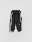 Spodenki dla niemowląt - Reserved - Bawełniane joggery - ciemnoszary - miniaturka - grafika 1