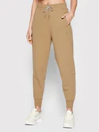 Spodnie sportowe damskie - Puma Spodnie dresowe Infuse 533423 Brązowy Relaxed Fit - miniaturka - grafika 1