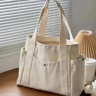 Torebki damskie - Płócienna torba shopper z kieszeniami - Beżowy - miniaturka - grafika 1