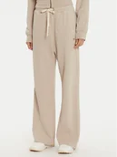 Spodnie sportowe damskie - Champion Spodnie dresowe 117638 Beżowy Wide Leg - miniaturka - grafika 1