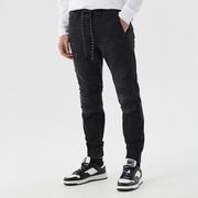 Spodnie męskie - Cropp - Jeansowe joggery z przeszyciami - Czarny - miniaturka - grafika 1