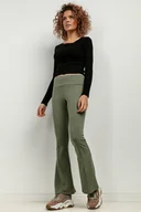 Spodnie sportowe damskie - Spodnie dzwony z dzianiny dresowej z kantem, T414, zielone - miniaturka - grafika 1