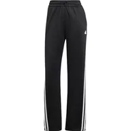 Spodnie rowerowe - adidas Damskie spodnie dresowe kultowe z 3 paskami i zatrzaskami - miniaturka - grafika 1