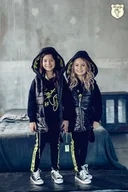 Moda i Uroda OUTLET - Kids By Voga Kamizelka Czerń - 158-164 - miniaturka - grafika 1
