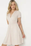 Sukienki - Jasnobeżowa Rozkloszowana Sukienka z Wiskozą o Kopertowym Kroju z Marszczeniem Adivas - miniaturka - grafika 1
