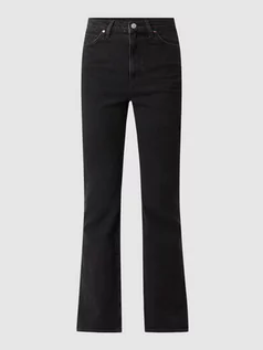 Spodnie damskie - Jeansy o rozkloszowanym kroju z dodatkiem streczu - grafika 1