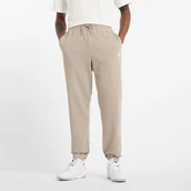 Spodnie męskie - Spodnie męskie New Balance MP41519ADS beżowe - miniaturka - grafika 1