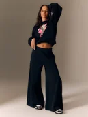 Spodnie damskie - 4F Spodnie z szerokimi nogawkami z modalem damskie - czarne XS - miniaturka - grafika 1