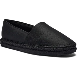 Calvin Klein Slip on z dodatkiem skóry - Trampki damskie - miniaturka - grafika 1