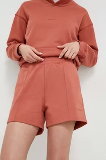 Spodenki damskie - New Balance szorty bawełniane kolor pomarańczowy gładkie high waist - grafika 1