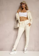 Spodnie damskie - Jasnobeżowe Dresowe Spodnie o Klasycznym Fasonie z Gumką w Pasie Ivemia - miniaturka - grafika 1