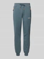 Spodnie sportowe męskie - Spodnie dresowe o kroju slim fit z nadrukiem z logo model ‘Gordon’ - miniaturka - grafika 1