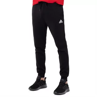 Spodnie sportowe męskie - Spodnie adidas Essentials Fleece Regular Tapered HL2236 - czarne - Adidas - grafika 1