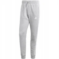 Dresy męskie - Spodnie męskie adidas Essentials Fleece 3-Stripes Tapered Cuff szare IJ6494 - miniaturka - grafika 1