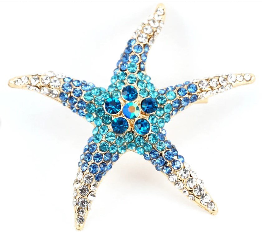 Broszka złota rozgwiazda vintage z kryształami niebieska