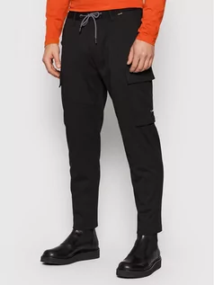 Spodnie męskie - Calvin Klein Spodnie materiałowe Comfort Knit K10K107781 Czarny Tapered Fit - grafika 1