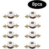 Zawiasy, okucia i inne akcesoria - 8 zabytkowych ceramicznych uchwytów z jednym otworem i śrubami do drzwiczek szafek, szuflad i mebli. - miniaturka - grafika 1