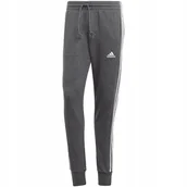 Dresy męskie - Spodnie męskie adidas Essentials French Terry Tapered Cuff 3-Stripes szare - miniaturka - grafika 1