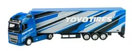 Samochody i pojazdy dla dzieci - BBURAGO VOLVO FH16 GLOBETROTTER 750 + PRZYCZEPĄ NIEBIESKI TOYO TIRES 1:43 31461 - miniaturka - grafika 1