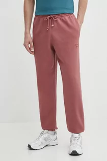 Spodnie męskie - Reebok spodnie dresowe kolor bordowy gładkie 100076352 - grafika 1