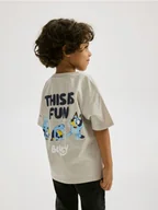 Bluzki dla niemowląt - Reserved - Bawełniany t-shirt Bluey - beżowy - miniaturka - grafika 1