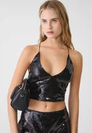 Koszulki i topy damskie - Stradivarius Top z cekinami i dekoltem halter  Czarny L - miniaturka - grafika 1