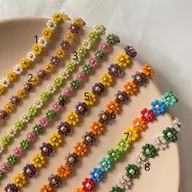 Naszyjniki - Naszyjniki kwiatki choker - miniaturka - grafika 1