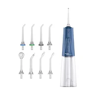 Torby podróżne - Ultracare Plus profesjonalny irygator do jamy ustnej, z 5 trybami, 8 dysz, zbiornik na wodę o pojemności 250 ml, możliwość ładowania przez USB, torba podróżna w zestawie (niebieska) - miniaturka - grafika 1