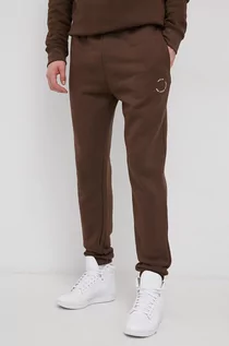 Spodnie męskie - Solid Spodnie męskie kolor brązowy gładkie - grafika 1