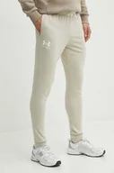 Spodnie męskie - Under Armour spodnie dresowe kolor beżowy z nadrukiem - miniaturka - grafika 1