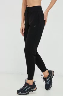 Spodnie damskie - 4F spodnie dresowe damskie kolor czarny gładkie - grafika 1