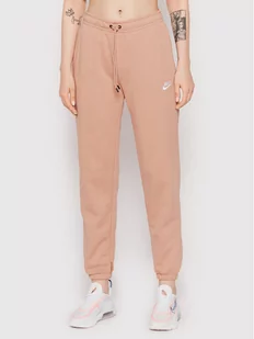 Nike Spodnie dresowe BV4091 Różowy Relaxed Fit - Spodnie sportowe damskie - miniaturka - grafika 1