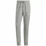 Dresy męskie - Spodnie męskie adidas Essentials French Terry Tapered Cuff 3-Stripes szare - miniaturka - grafika 1