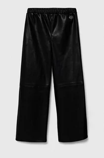 Spodnie i spodenki dla dziewczynek - Guess spodnie dziecięce kolor czarny gładkie - grafika 1