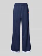 Spodnie sportowe damskie - Spodnie typu track pants z prostą nogawką i naszywką z logo model ‘LORCE’ - miniaturka - grafika 1