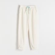 Spodnie i spodenki dla dziewczynek - Reserved - Spodnie ze strukturalnej dzianiny - Kremowy - miniaturka - grafika 1