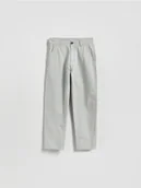 Spodnie i spodenki dla chłopców - Reserved - Bawełniane spodnie chino - kremowy - miniaturka - grafika 1