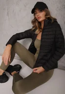 Kurtki damskie - Czarna Przejściowa Kurtka z Pikowaniem Elastycznymi Wstawkami i Kapturem Fezilina - miniaturka - grafika 1