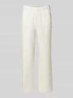 Spodnie sportowe męskie - Spodnie dresowe krój loose fit z czystej Bawełna - miniaturka - grafika 1