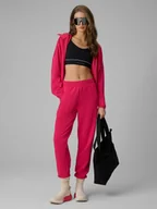 Spodnie sportowe damskie - 4F Spodnie dresowe joggery damskie - różowe XS - miniaturka - grafika 1